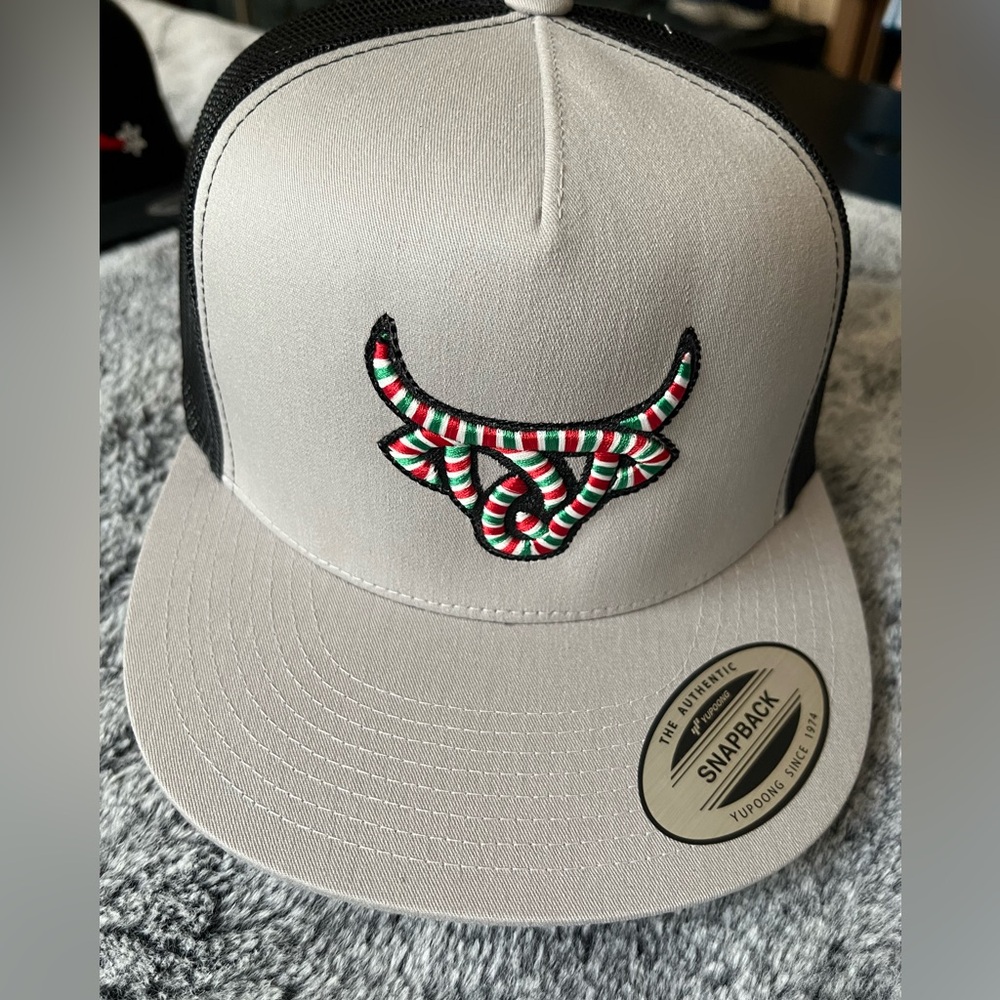 The Classic Gray and Black Snapback with Embroidered Bull Design